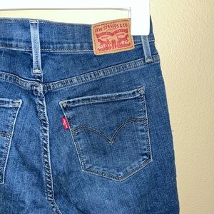 720 high rise stretchy distressed skinny jeans